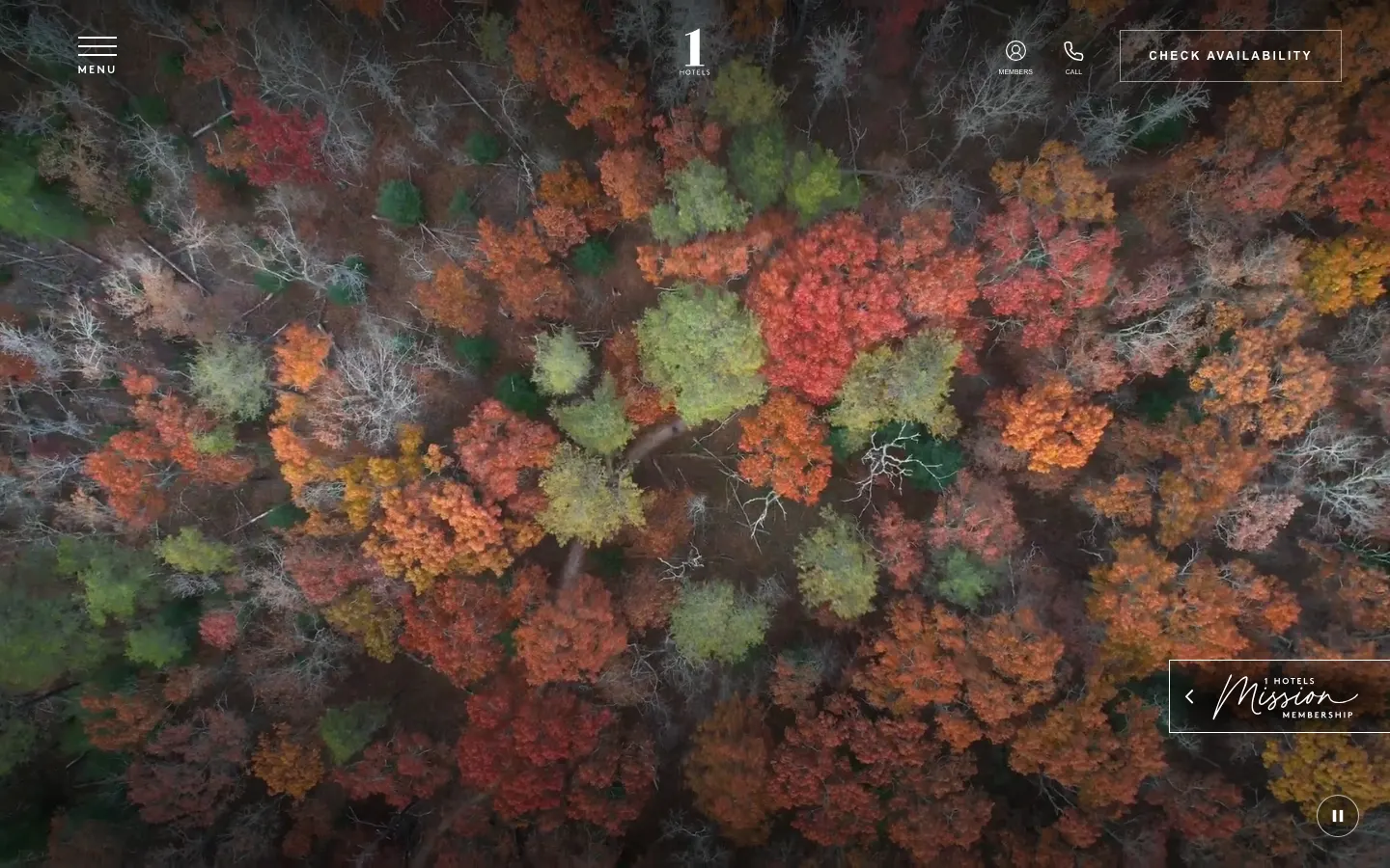 1 Hotels' homepage on 10 October 2026: an aerial video of an autumn forest in red, orange and green, with the 1 Hotels logo, a Check Availability button and a Mission Membership tab
