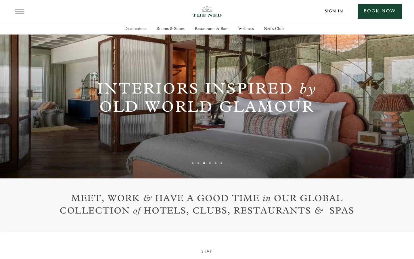 The Ned's homepage on 10 October 2026: a guest room with a scalloped headboard under the line Interiors inspired by Old World Glamour, the Book Now button top right, and below it the line Meet, work and have a good time in our global collection of hotels, clubs, restaurants and spas
