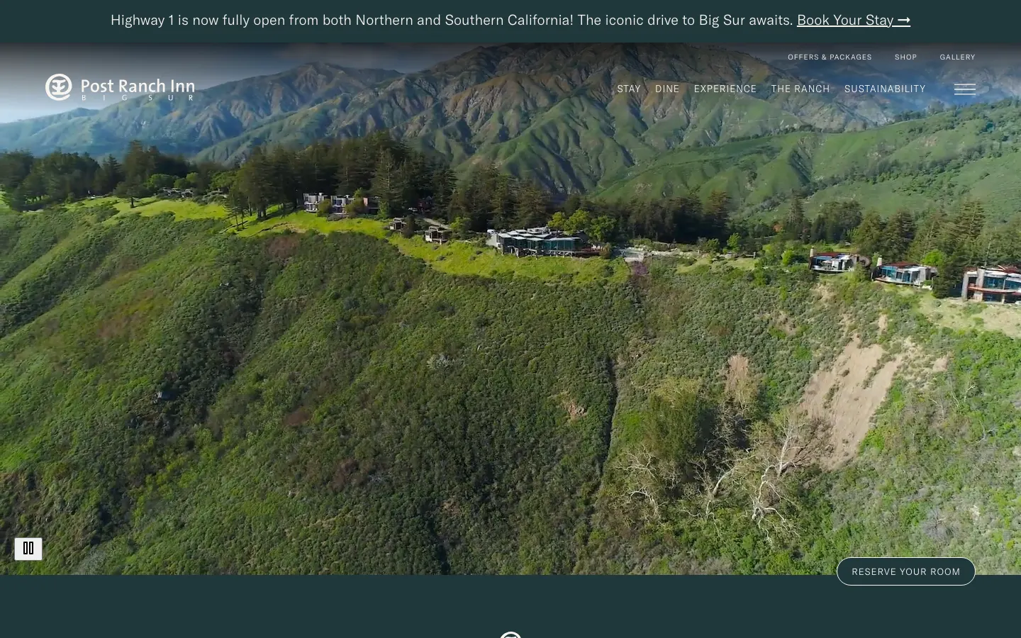 Post Ranch Inn's homepage on 10 October 2026: an aerial photograph of the inn's houses on a green Big Sur ridge, with a banner across the top reading Highway 1 is now fully open from both Northern and Southern California