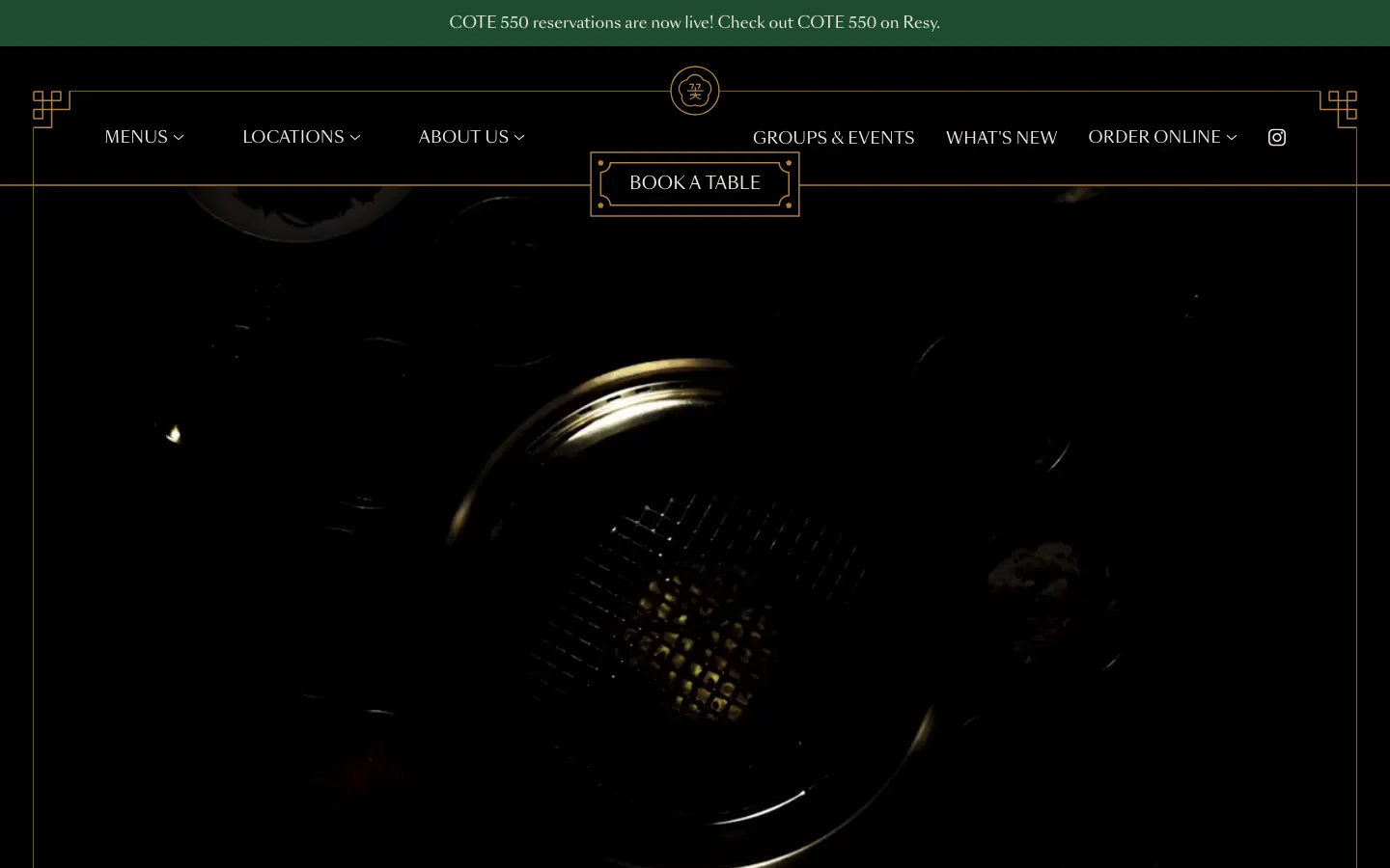 COTE Korean Steakhouse homepage on 30 September 2026: a dark frame with gold art deco corners, Book a Table centred, and a reservations banner above