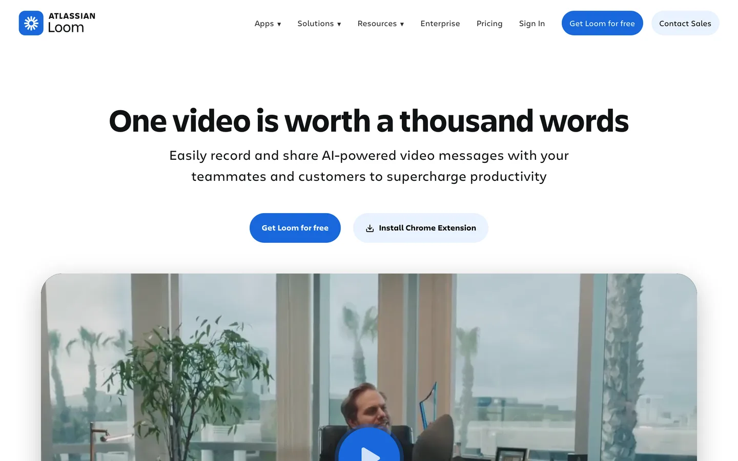 Loom homepage — 'One video is worth a thousand words' headline above an autoplaying product video