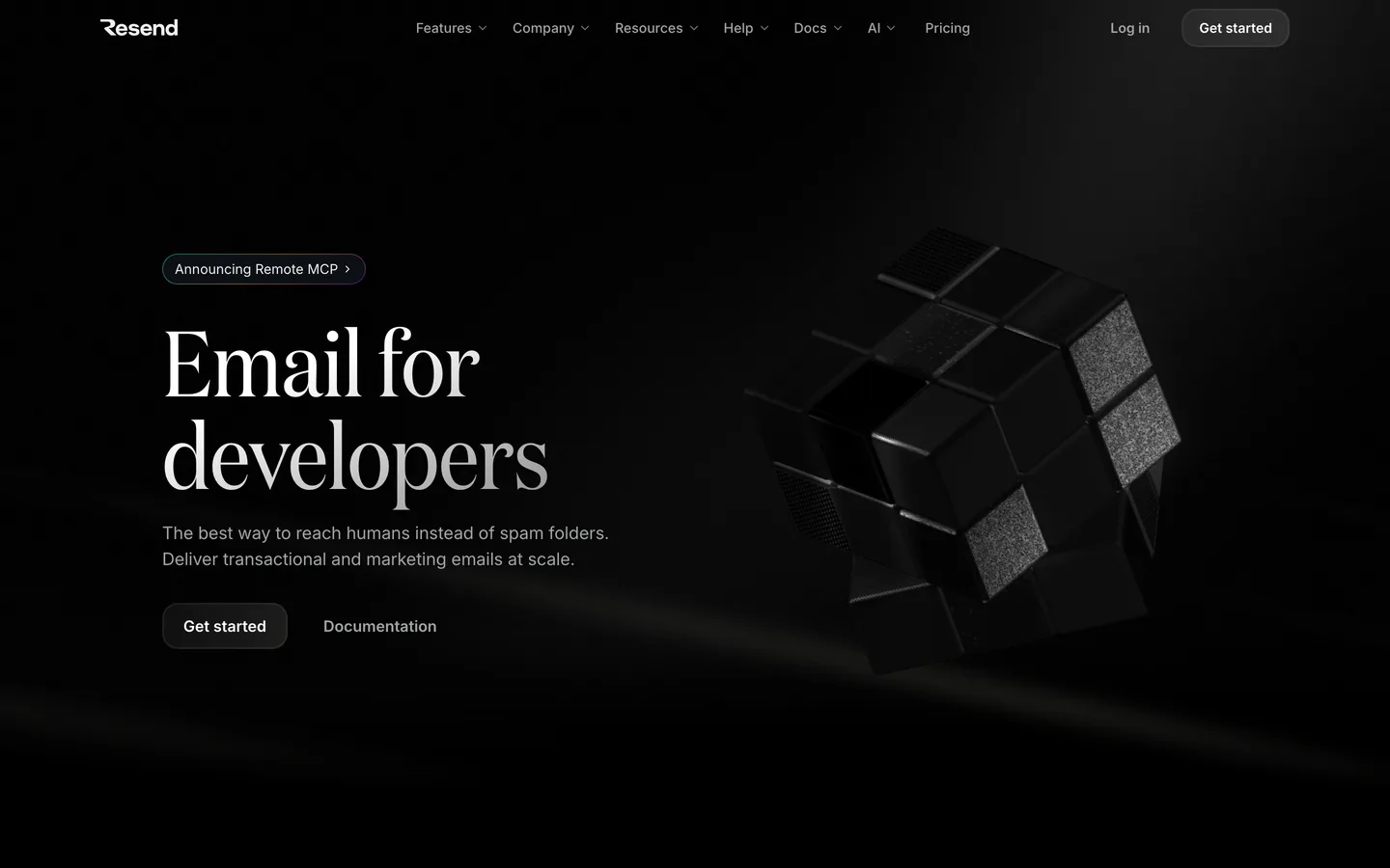 Resend homepage — 'Email for developers' serif headline beside a black-on-black 3D Rubik's cube render