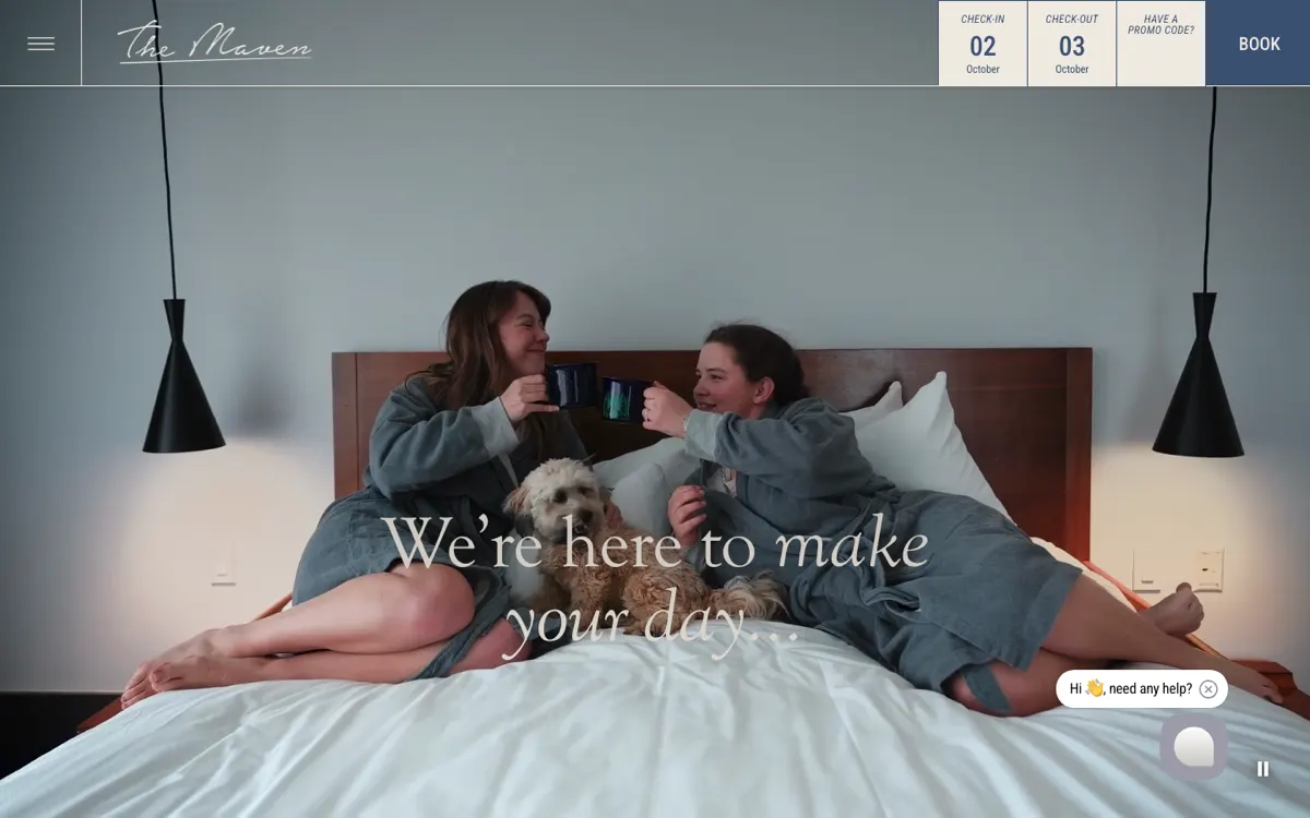 The live Maven homepage on 1 October 2026: the script wordmark and hamburger on the left, the check-in, check-out, promo code and Book bar on the right, and a full-screen video of two guests in robes with a dog under the line We're here to make your day